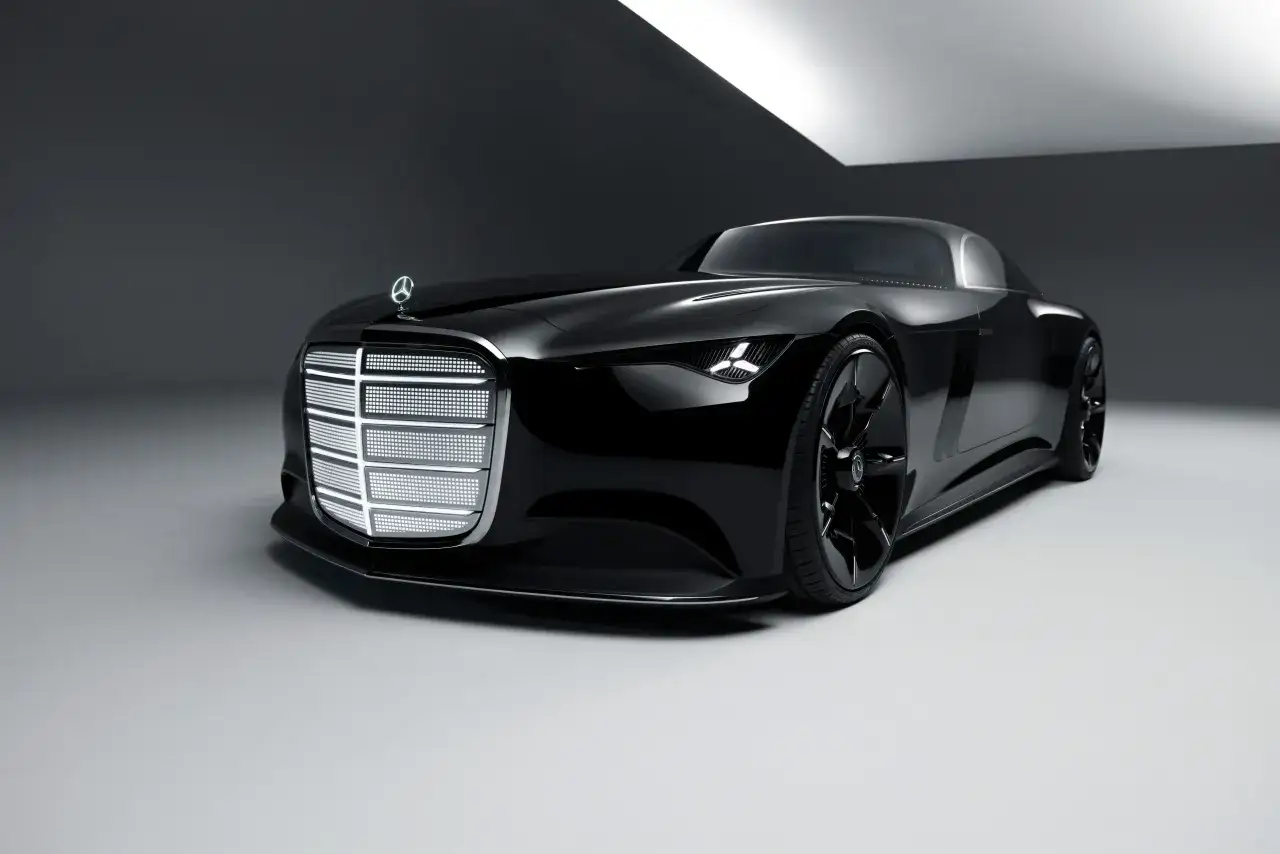Czarny, futurystyczny Mercedes 2025 z podświetlanym grillem i reflektorami, prezentowany w minimalistycznym studiu.