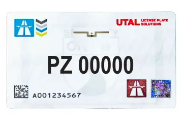 Tablica rejestracyjna PZ 00000 z logo UTAL License Plate Solutions. GTC rejestracja.